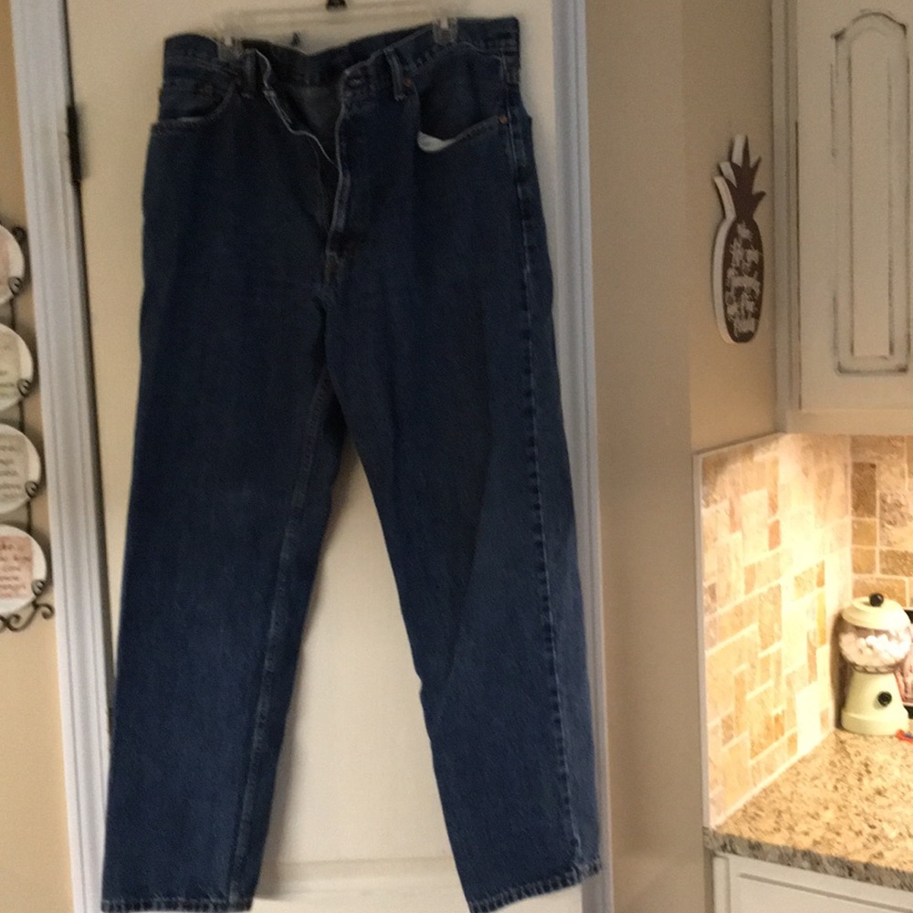 Men’s Levi’s jeans, slightly worn. Broken beltloop